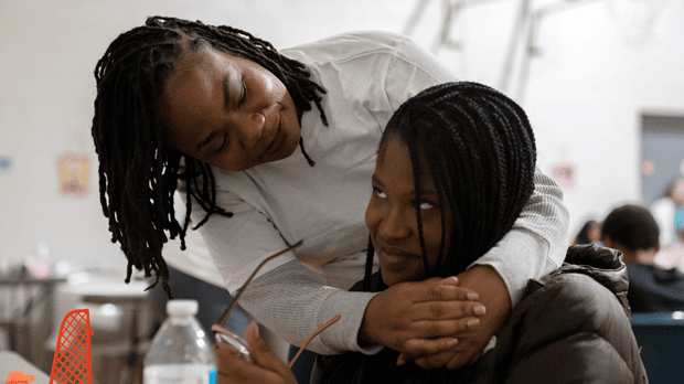 Erika Ray comforts her daughter Jada Lesure